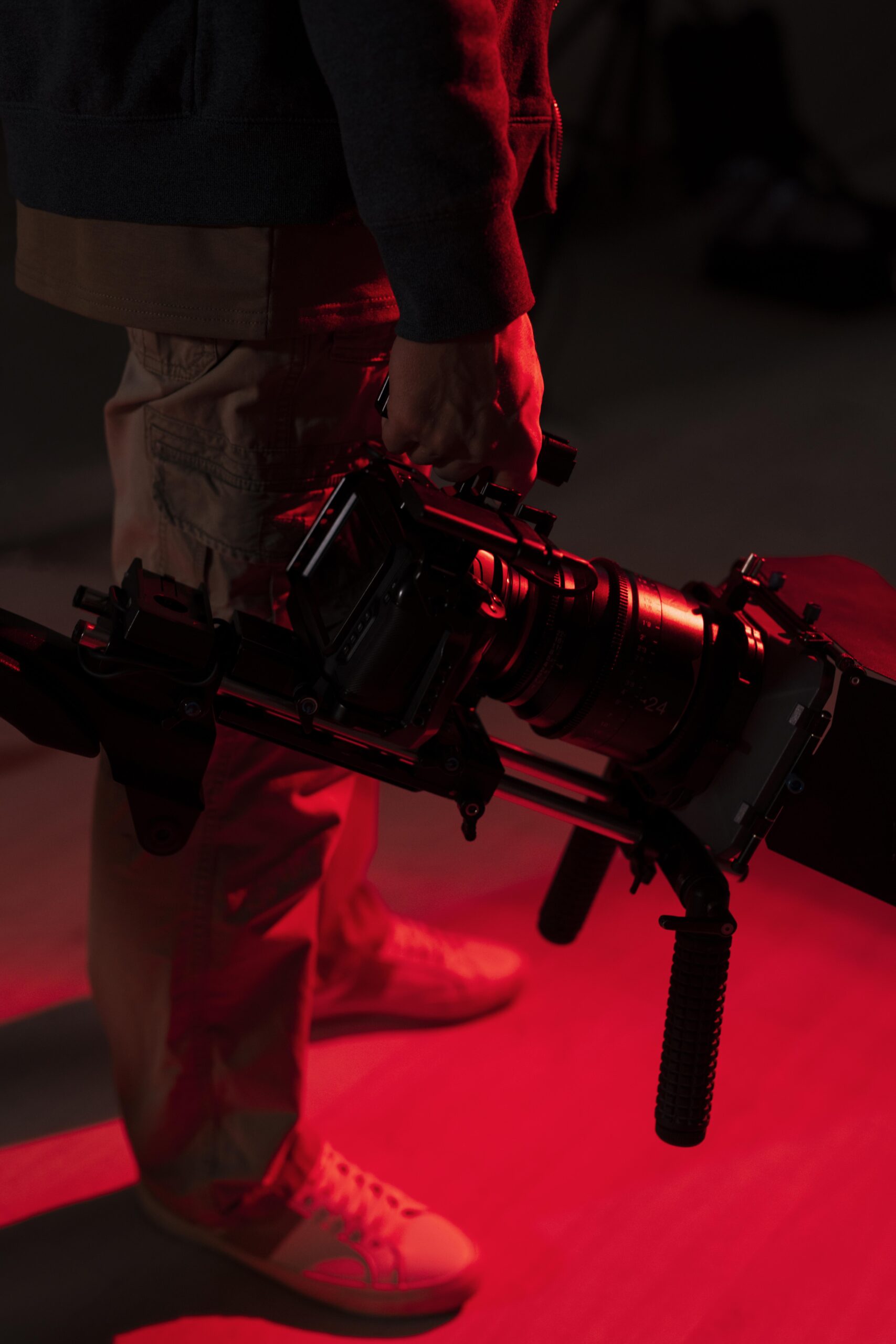 man-filming-with-professional